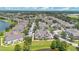 Community view, showcasing various townhouses and landscaping at 8981 Lee Vista Blvd # 2209, Orlando, FL 32829