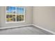 Bedroom with large windows overlooking a lake at 8981 Lee Vista Blvd # 2209, Orlando, FL 32829