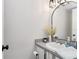 Small bathroom with gray vanity and modern decor at 282 S Fox Chase Pt, Longwood, FL 32779