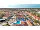 Aerial view of community with pool, buildings, and landscaping at 1087 Park Ridge Cir, Kissimmee, FL 34746