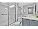 Clean bathroom with shower/tub combo, vanity with a quartz countertop, and a mirror at 1087 Park Ridge Cir, Kissimmee, FL 34746