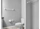 Small bathroom with toilet, tile floor, and a storage closet at 1087 Park Ridge Cir, Kissimmee, FL 34746