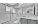 Clean bathroom with shower/tub combo, vanity with a quartz countertop, and a mirror at 1087 Park Ridge Cir, Kissimmee, FL 34746