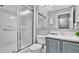 Clean bathroom with shower/tub combo, vanity with a quartz countertop, and a mirror at 1087 Park Ridge Cir, Kissimmee, FL 34746