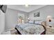 Bedroom with king bed, window, and bedside tables at 1087 Park Ridge Cir, Kissimmee, FL 34746