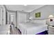 King-size bed, dresser and nightstands, and access to hallway at 1087 Park Ridge Cir, Kissimmee, FL 34746