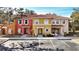 Three-unit townhome building with Spanish-style architecture at 1087 Park Ridge Cir, Kissimmee, FL 34746