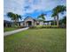 Community center with pool and palm trees at 11986 Sands Cv, Orlando, FL 32828