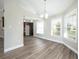 Dining area with hardwood floors and large windows at 122 Baywest Dr, Orlando, FL 32835