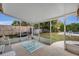 Relaxing screened porch overlooking the backyard pool at 137 S Deerwood Ave, Orlando, FL 32825