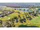 Community overview featuring a golf course and lake at 14493 Swanley St, Orlando, FL 32832