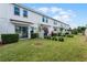 Private backyard with a grassy area and small patio at 14493 Swanley St, Orlando, FL 32832
