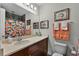 Clean bathroom with a shower/tub combo and stylish fixtures at 14493 Swanley St, Orlando, FL 32832