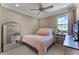Light and airy bedroom with a comfortable bed and plenty of natural light at 14493 Swanley St, Orlando, FL 32832