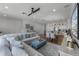 Open floorplan with living room, kitchen, and dining area at 14493 Swanley St, Orlando, FL 32832