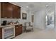 Convenient wet bar with beverage fridge and coffee station at 14493 Swanley St, Orlando, FL 32832