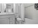 Bathroom with white vanity, toilet, and bathtub at 15810 Shorebird Ln, Winter Garden, FL 34787