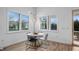 Breakfast nook with a round table, four chairs, and sliding glass doors at 15810 Shorebird Ln, Winter Garden, FL 34787