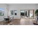 Bright breakfast nook with view of backyard through sliding glass doors at 15810 Shorebird Ln, Winter Garden, FL 34787