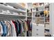 Well-organized closet with ample hanging and shelf space at 15810 Shorebird Ln, Winter Garden, FL 34787
