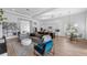 Open concept living and dining area with modern furnishings at 15810 Shorebird Ln, Winter Garden, FL 34787