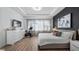 Large main bedroom with plenty of light and a workout area at 15810 Shorebird Ln, Winter Garden, FL 34787