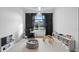 Bright playroom features built-in shelving, a desk, and a ball pit at 15810 Shorebird Ln, Winter Garden, FL 34787