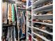 Well-organized walk-in closet with ample shelving and hanging space at 15810 Shorebird Ln, Winter Garden, FL 34787