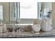 Elegant bathroom boasting granite vanity and stylish accents at 1688 Three Bars Rd, Kissimmee, FL 34744