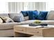 Bright living room featuring a comfy sectional sofa and stylish coffee table at 1688 Three Bars Rd, Kissimmee, FL 34744