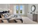 Main bedroom with large windows and stylish decor at 1688 Three Bars Rd, Kissimmee, FL 34744