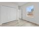 Bright bedroom with double door closet and window at 16895 Sw 50Th Cir, Ocala, FL 34473
