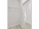 Closet with wire shelving and access to another room at 16895 Sw 50Th Cir, Ocala, FL 34473