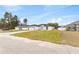 Two-story house with a modern design and landscaping at 16895 Sw 50Th Cir, Ocala, FL 34473