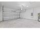 Spacious garage with concrete floor and overhead door at 16895 Sw 50Th Cir, Ocala, FL 34473