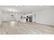 Open concept kitchen with white cabinets and island at 16895 Sw 50Th Cir, Ocala, FL 34473