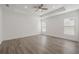 Bright and spacious bedroom with wood-look flooring at 1707 Merthie Dr, Sanford, FL 32771
