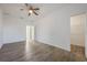 Spacious bedroom with wood flooring and walk-in closet at 1707 Merthie Dr, Sanford, FL 32771