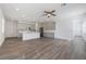 Open concept kitchen with gray cabinets and island at 1707 Merthie Dr, Sanford, FL 32771