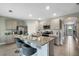 Open concept kitchen with island and stainless steel appliances at 1711 Three Bars Rd, Kissimmee, FL 34744