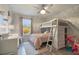 Charming bedroom with a bunk bed and ample storage at 1809 Silver Valley Ct, Apopka, FL 32712