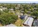 Aerial view of home situated among lush greenery and mature trees at 1875 Staunton Ave, Winter Park, FL 32789