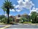 Community center with palm trees and parking at 1950 Summer Club Dr # 302, Oviedo, FL 32765