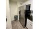 Stainless steel refrigerator in kitchen at 1950 Summer Club Dr # 302, Oviedo, FL 32765