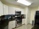 Modern kitchen with stainless steel appliances at 1950 Summer Club Dr # 302, Oviedo, FL 32765