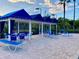 Pool area with cabanas and lounge chairs at 1950 Summer Club Dr # 302, Oviedo, FL 32765