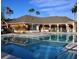 Community pool with surrounding patio at 1950 Summer Club Dr # 302, Oviedo, FL 32765