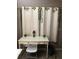 White study table with chair, and curtains at 1950 Summer Club Dr # 302, Oviedo, FL 32765