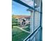 View of the condo building and surrounding landscape at 1950 Summer Club Dr # 302, Oviedo, FL 32765