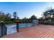 Evening view of deck and pool with string lights at 2131 Dyan Way, Maitland, FL 32751